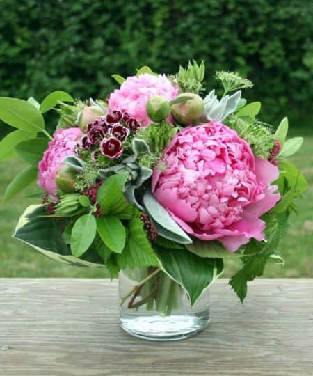 Gorgeous peonies mixed with greenery. Give a breathtakingly beautiful and unique gift. Note that each farm fresh bouquet is hand-crafted and will naturally vary from the sampled photos including peonies, Fresh cut garden flowers and unique herbs.